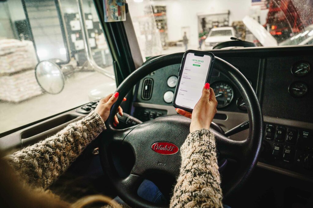 Person viewing mobile device screen